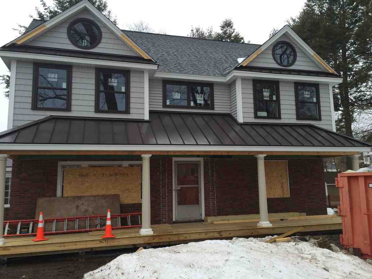 Why Burlington Homeowners are Switching to Metal Roofs Commercial Roofing